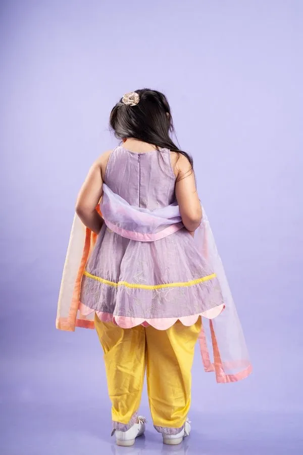 Adorable Lavender top with golden yellow dhoti pants and matching dupatta, perfect for festive celebrations