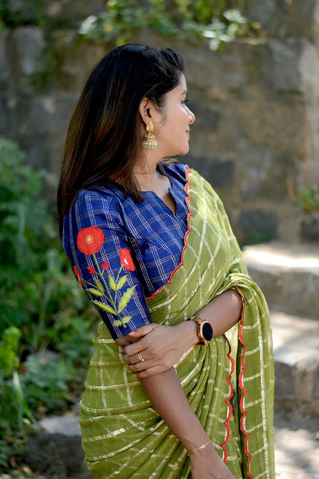 Green checked chiffon saree with blue silk hand work blouse