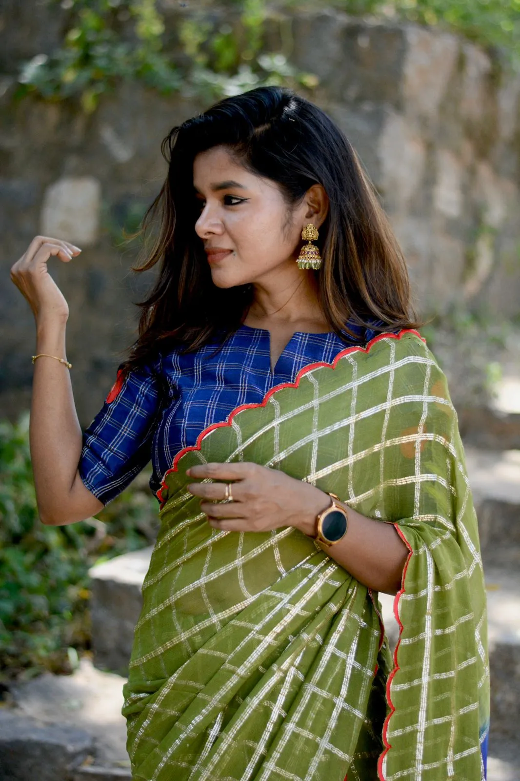 Green checked chiffon saree with blue silk hand work blouse