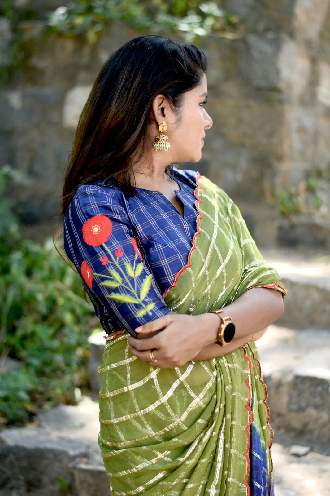 Green checked chiffon saree with blue silk hand work blouse