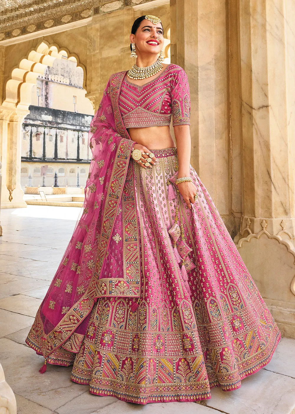 Wonderous Pink Bridal Wear Heavy Embroidered Silk Lehenga Choli